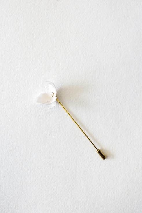 Fuchsia lapel pin with silk flower